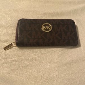 Michael Kors large wallet in brown.